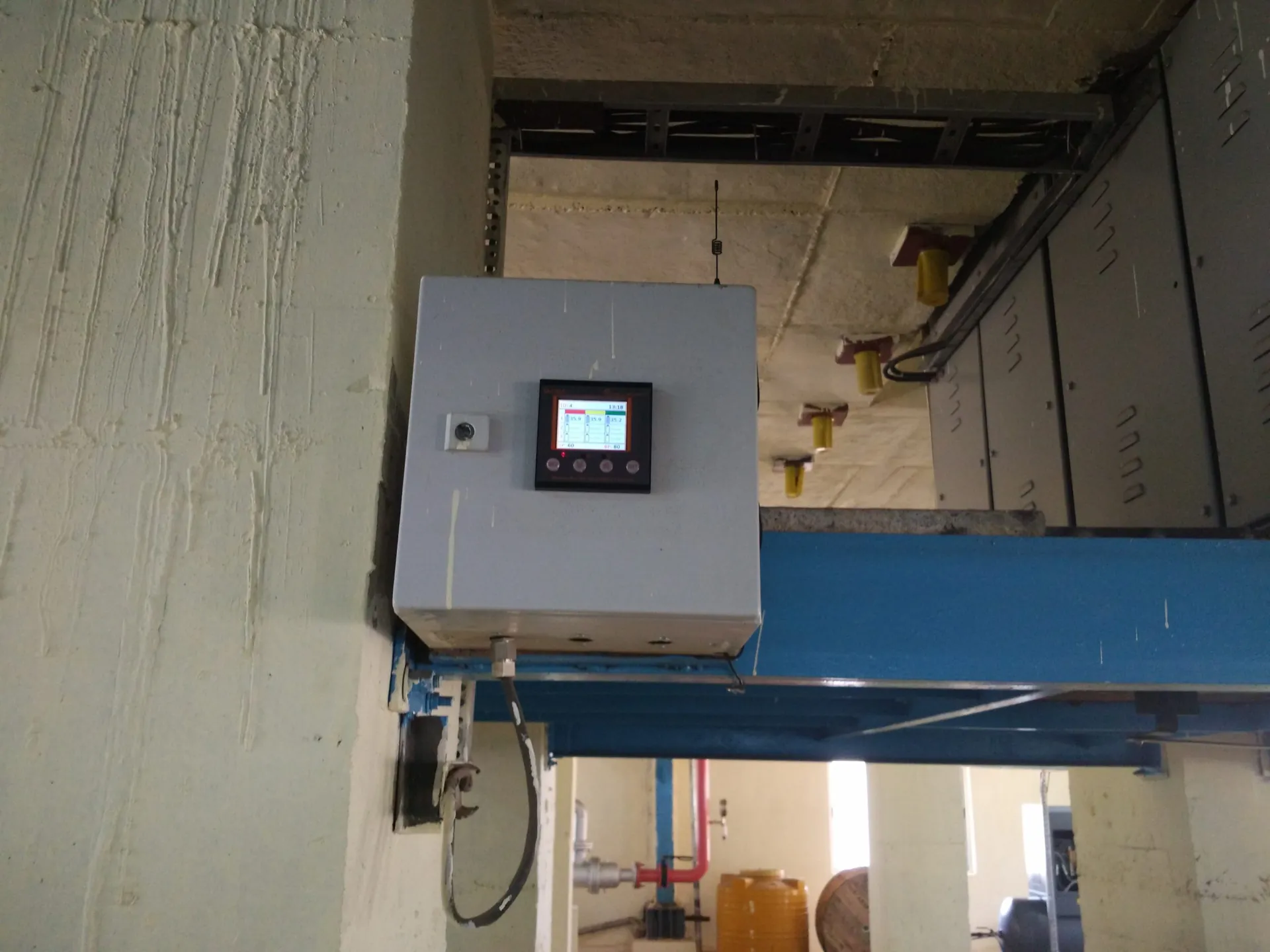 BBC969 controller mounted in a wall enclosure next to a busbar trunking run